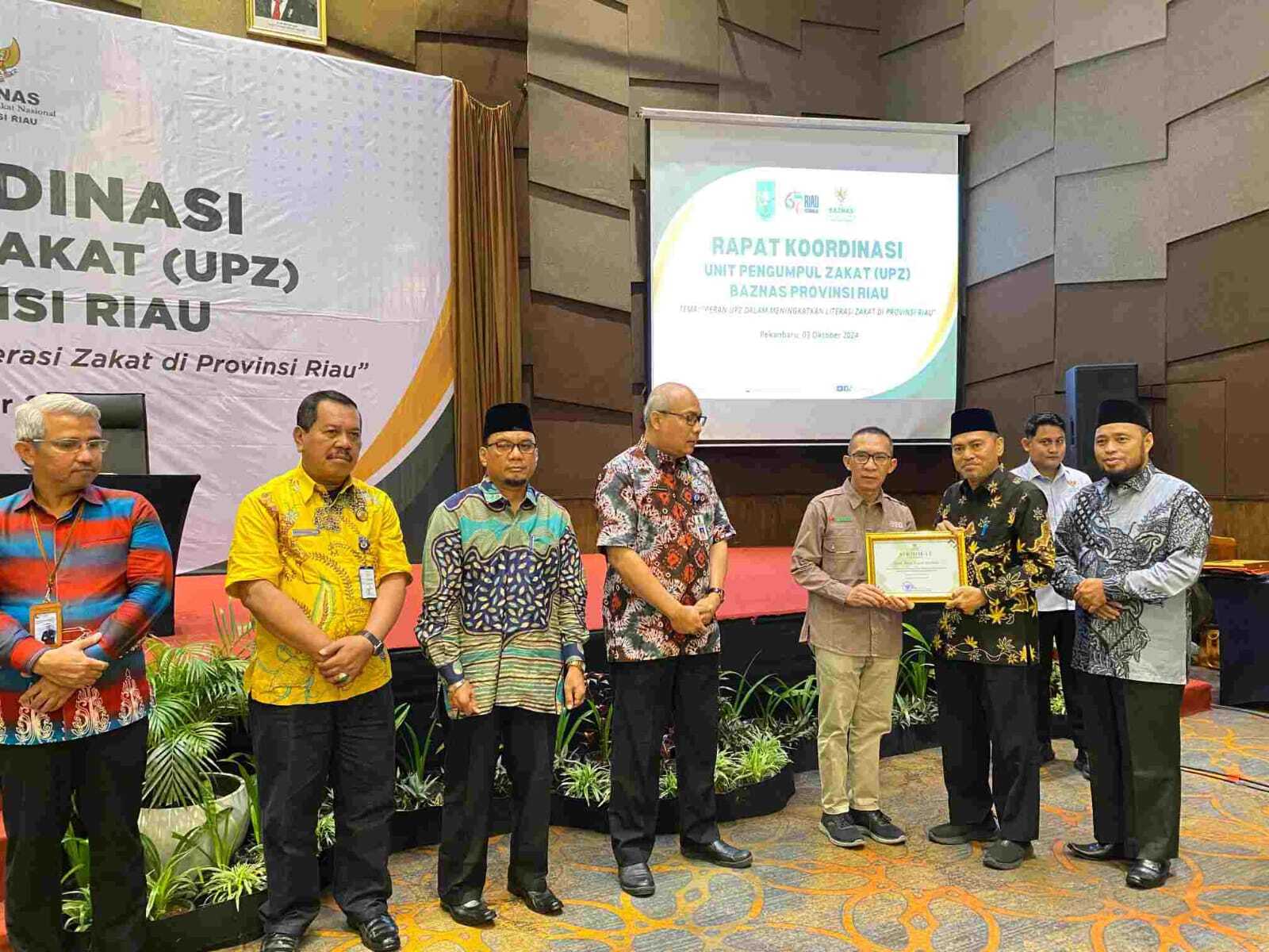 Mitra Pendukung Payroll System, BRK Syariah Terima Penghargaan dair Baznas Riau